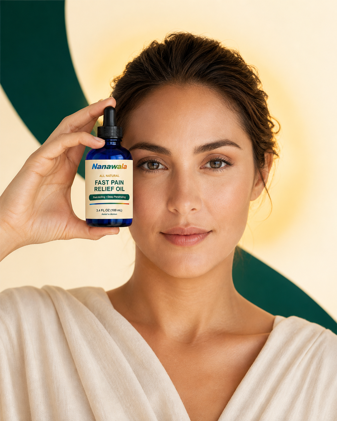 Woman holding a Nanawala 3.4 fl oz bottle