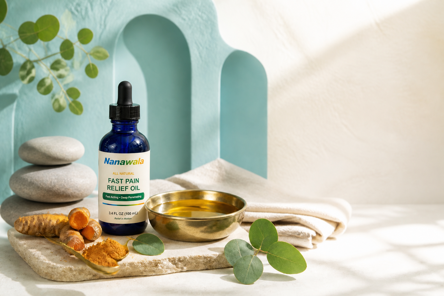 Nanawala oil with stones, turmeric, eucalyptus leaves and a brass bowl