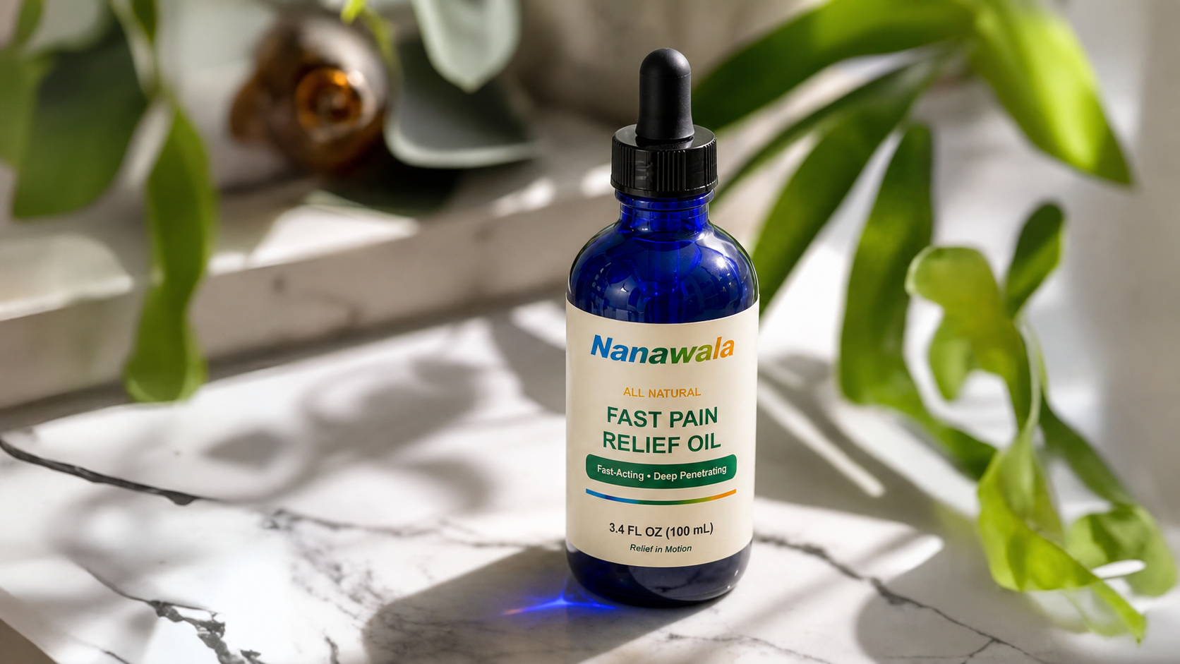 Nanawala pain relief oil surrounded by fresh green leaves